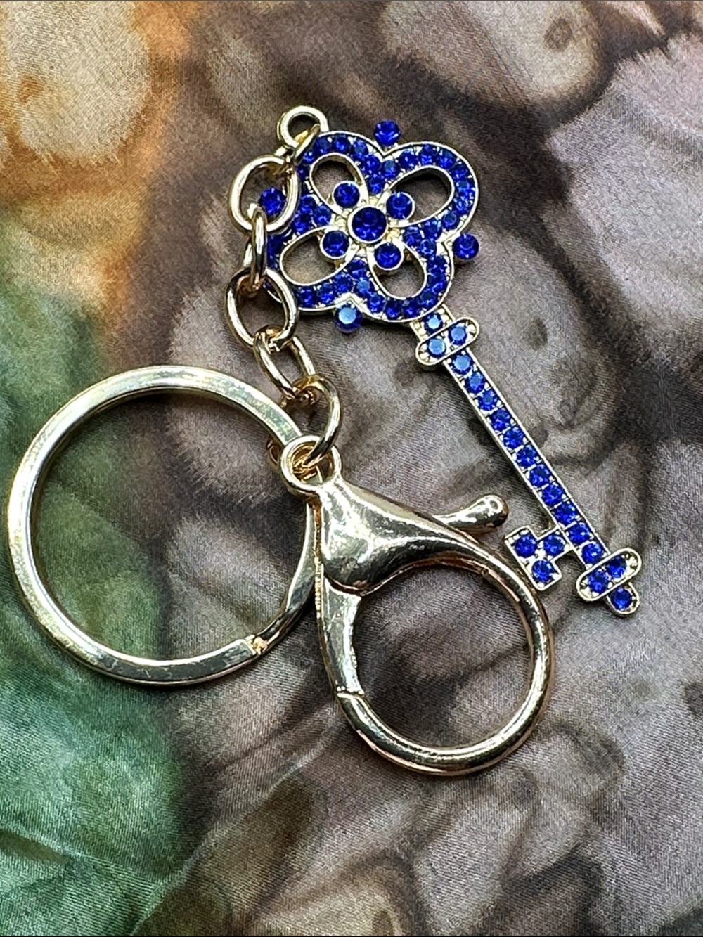 Gold Key Charm Keyring with Blue Crystal Accents
